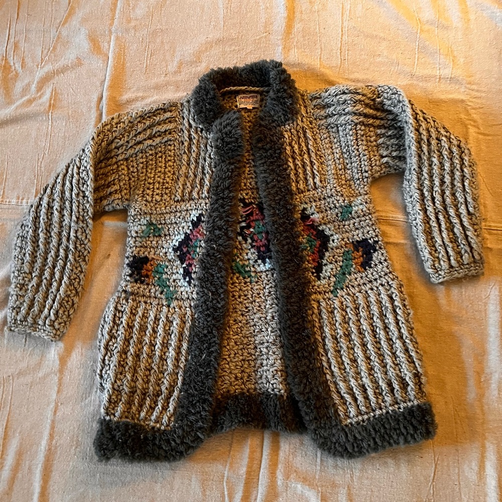 gorgeous vintage cardigan sweater 
answers by riddle